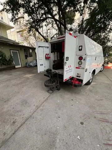 Magnet Plumbing service vehicle on-site for Grease Trap Cleaning in Villa Valencia